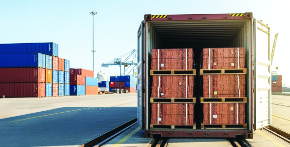 Copper material on pallets in a shipping container at the docks Copper material on pallets in a shipping container at the docks