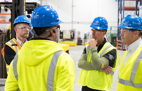 Our team discussing health and safety enhancements in our facilities Our team discussing health and safety enhancements in our facilities